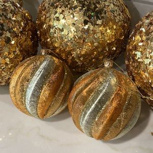 Gold and rose gold ornaments, set of four 6” and seventeen 3.5” ornaments